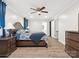 Serene main bedroom with neutral colors, hardwood floors, and a doorway to the main bathroom at 1238 Carl Allen Rd, Edgemoor, SC 29712