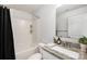 Bathroom with shower and marble countertop at 1428 Winding Stream Rd, Charlotte, NC 28206