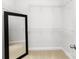 Walk-in closet with carpeting and wire shelving at 1428 Winding Stream Rd, Charlotte, NC 28206