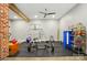 A functional home exercise room boasts a weight rack, exercise ball, and gray walls at 16525 Tulloch Rd, Charlotte, NC 28278