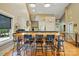 Bright kitchen with a large central island, stainless steel appliances, and open layout at 16525 Tulloch Rd, Charlotte, NC 28278
