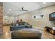 Spacious living area with concrete floors, comfortable seating and modern decor at 16525 Tulloch Rd, Charlotte, NC 28278