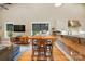Comfortable living space with a dining area, kitchen, and ample seating for Gathering gatherings at 16525 Tulloch Rd, Charlotte, NC 28278