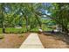 Picturesque waterfront view of a lake from a path leading down to the water at 16525 Tulloch Rd, Charlotte, NC 28278