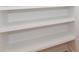 White shelving with light wood flooring at 1724 Dallas Ave, Charlotte, NC 28205