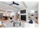 An open-concept living room flows into the kitchen, creating a connected space for entertaining and daily living at 1728 Dallas Ave, Charlotte, NC 28205