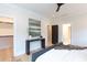 Primary bedroom with walk in closet and hardwood floors at 1728 Dallas Ave, Charlotte, NC 28205