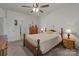 Comfortable bedroom offers a serene retreat with ample space, ceiling fan, and well-lit windows for relaxation at 185 Willow Valley Dr, Mooresville, NC 28115