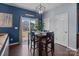 Enjoy the cozy dining area with backyard access, perfect for meals with a view and indoor-outdoor living at 185 Willow Valley Dr, Mooresville, NC 28115