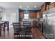 Spacious kitchen features an island with seating and stainless steel appliances at 185 Willow Valley Dr, Mooresville, NC 28115