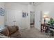 Relaxing living room features a sofa, a side table with a lamp, and a closet at 185 Willow Valley Dr, Mooresville, NC 28115
