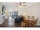 Open living space with hardwood floors, a ceiling fan, and a view into the kitchen at 1925 Sandal Brook Rd, Indian Land, SC 29707