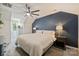 Main bedroom featuring a ceiling fan, bedside tables, and a serene atmosphere at 1925 Sandal Brook Rd, Indian Land, SC 29707