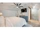 Bedroom with a ceiling fan, dresser, closet, and stairs to an upper or lower level at 1925 Sandal Brook Rd, Indian Land, SC 29707