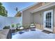 Private patio includes comfortable seating and direct access to the home, enhancing outdoor living at 1925 Sandal Brook Rd, Indian Land, SC 29707