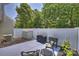 Spacious patio with comfortable seating and a grill, perfect for outdoor entertaining and relaxation at 1925 Sandal Brook Rd, Indian Land, SC 29707
