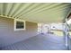 Covered back porch with wood deck, offering a relaxing outdoor space with a view of the backyard at 2031 36Th Ne St, Hickory, NC 28601
