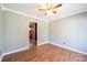 Bedroom with laminate floors, a ceiling fan, and neutral walls at 2031 36Th Ne St, Hickory, NC 28601