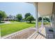 Welcoming front porch overlooking a large, well-maintained yard with mature trees at 2031 36Th Ne St, Hickory, NC 28601