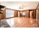 Cozy living room showcasing a stone fireplace and beautiful laminate flooring at 2031 36Th Ne St, Hickory, NC 28601