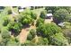 Expansive green lot with lush trees, houses and a cleared space at 2131 E Nc 10 Hwy, Conover, NC 28613