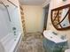 Cozy bathroom features tub/shower, vanity, and custom towel storage at 2131 E Nc 10 Hwy, Conover, NC 28613