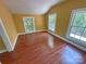 Bedroom with natural light from multiple windows and hardwood floors at 2131 E Nc 10 Hwy, Conover, NC 28613