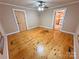 Open concept bedroom with hardwood floors, high ceilings and natural light at 2131 E Nc 10 Hwy, Conover, NC 28613
