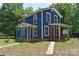 Inviting two-story home with a covered porch and nicely maintained front yard at 2131 E Nc 10 Hwy, Conover, NC 28613