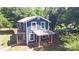 Charming two-story blue home with a cozy front porch and swing at 2131 E Nc 10 Hwy, Conover, NC 28613