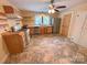 Kitchen with stainless steel appliances, light wood cabinetry, and tile flooring at 2131 E Nc 10 Hwy, Conover, NC 28613