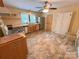An eat-in kitchen design with white appliances, light cabinetry and ample natural light at 2131 E Nc 10 Hwy, Conover, NC 28613