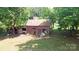 Rustic shed with a weathered exterior, showcasing potential storage and character at 2131 E Nc 10 Hwy, Conover, NC 28613