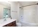 Bathroom featuring tub-shower combination, single sink vanity, and window at 2180 Shady Pond Dr, Clover, SC 29710