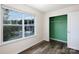 Bedroom featuring a window with views of the outdoors and a closet with green paint inside at 2180 Shady Pond Dr, Clover, SC 29710