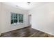 Inviting bedroom with great light and wood-look floors, next to a bathroom at 2180 Shady Pond Dr, Clover, SC 29710