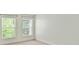 Bright bedroom area featuring large windows allowing tons of natural light at 2215 Henery Tuckers Ct, Charlotte, NC 28270