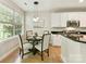 Breakfast nook featuring a window view, pendant lights, and stainless steel appliances at 2215 Henery Tuckers Ct, Charlotte, NC 28270