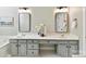 Modern main bathroom with double sink vanity and framed mirrors at 2215 Henery Tuckers Ct, Charlotte, NC 28270