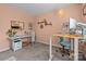 Stylish home office featuring contemporary furnishings, shelves, and an adjustable standing desk at 229 Cramerton Mills Pkwy, Cramerton, NC 28032