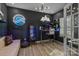 Modern office space with neon lighting, sleek desk setup, and wood-look floors at 229 Cramerton Mills Pkwy, Cramerton, NC 28032