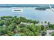 Aerial view of lakefront property with Lake Norman in the background at 303 Northwest Dr, Davidson, NC 28036