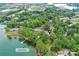 Aerial view showcasing community pool, amenities, pickleball, and waterfront access for a desirable lakeside lifestyle at 303 Northwest Dr, Davidson, NC 28036