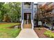 Exterior view of the building with a well-maintained front yard and landscaping at 303 Northwest Dr, Davidson, NC 28036