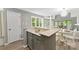 Kitchen area with granite countertops, neutral color palette, and a view to an open living space at 303 Northwest Dr, Davidson, NC 28036