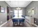 Well-lit dining room with a long table set for a Gathering meal, perfect for everyday and special occasions at 3212 Gilroy Dr, Fort Mill, SC 29707