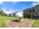 Fire pit area with paver patio and inviting seating, perfect for outdoor gatherings and relaxation at 3212 Gilroy Dr, Fort Mill, SC 29707