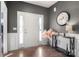 Elegant foyer featuring hardwood floors, a stylish console table, and a well-lit, inviting atmosphere at 3212 Gilroy Dr, Fort Mill, SC 29707