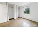 Bedroom with tile floor, closet, and natural light at 326 Orchard Trace Ln # 3, Charlotte, NC 28213