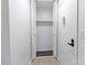 Hall closet with bi-fold doors and shelf offers storage space at 326 Orchard Trace Ln # 3, Charlotte, NC 28213